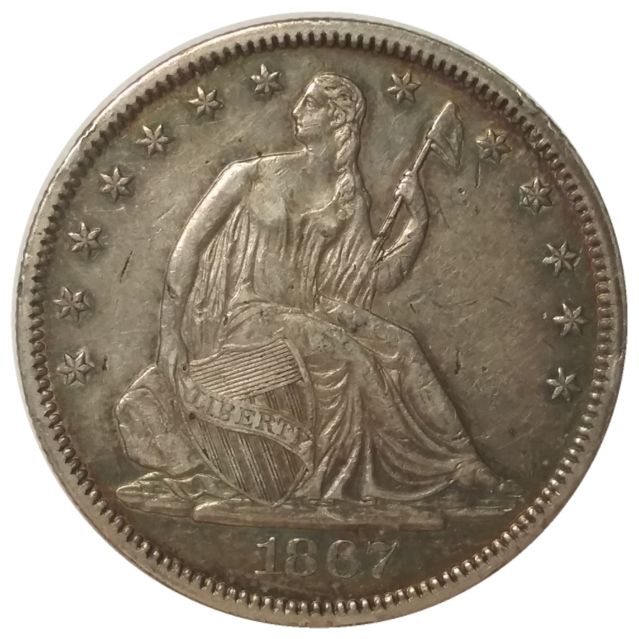 1867-50c-Liberty-Seated-Half-Dollar-Vs.-Heymikep's-Registry-Coin